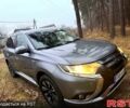 Серый Мицубиси Аутлендер, объемом двигателя 2 л и пробегом 270 тыс. км за 17390 $, фото 1 на Automoto.ua