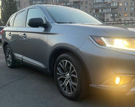 Серый Мицубиси Аутлендер, объемом двигателя 2.4 л и пробегом 225 тыс. км за 12000 $, фото 2 на Automoto.ua