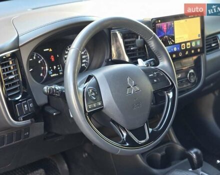 Серый Мицубиси Аутлендер, объемом двигателя 2.36 л и пробегом 164 тыс. км за 17500 $, фото 12 на Automoto.ua