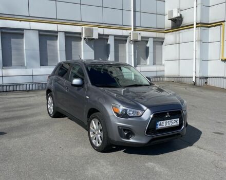 Серый Мицубиси Аутлендер, объемом двигателя 2.4 л и пробегом 250 тыс. км за 10800 $, фото 1 на Automoto.ua