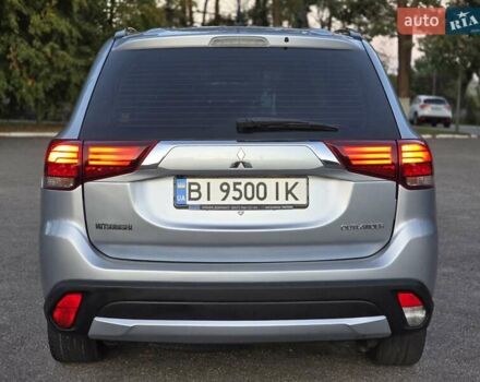 Серый Мицубиси Аутлендер, объемом двигателя 2.36 л и пробегом 164 тыс. км за 17900 $, фото 3 на Automoto.ua