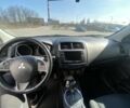 Серый Мицубиси Аутлендер, объемом двигателя 2.4 л и пробегом 250 тыс. км за 10800 $, фото 6 на Automoto.ua