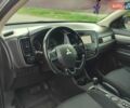 Серый Мицубиси Аутлендер, объемом двигателя 2.36 л и пробегом 210 тыс. км за 13500 $, фото 4 на Automoto.ua