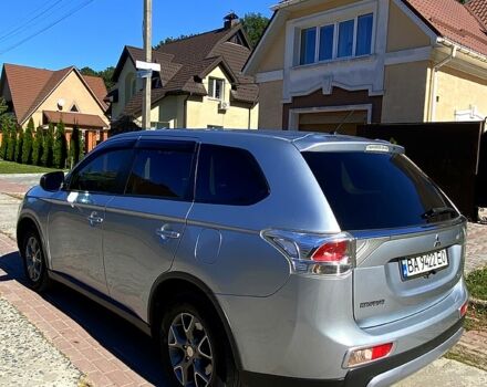 Серый Мицубиси Аутлендер, объемом двигателя 2.4 л и пробегом 250 тыс. км за 13300 $, фото 1 на Automoto.ua