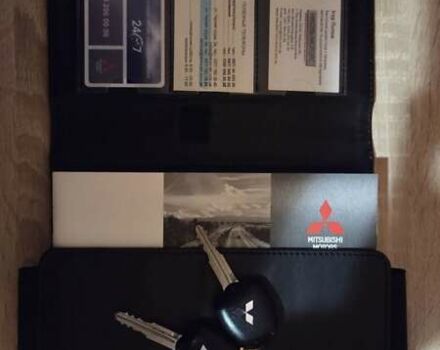 Серый Мицубиси Аутлендер, объемом двигателя 2 л и пробегом 44 тыс. км за 17900 $, фото 78 на Automoto.ua