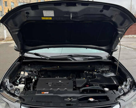 Серый Мицубиси Аутлендер, объемом двигателя 2.36 л и пробегом 182 тыс. км за 15500 $, фото 20 на Automoto.ua