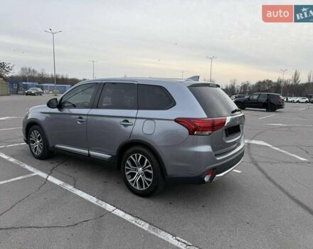 Сірий Міцубісі Аутлендер, об'ємом двигуна 2.36 л та пробігом 147 тис. км за 13200 $, фото 6 на Automoto.ua