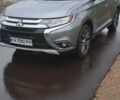 Серый Мицубиси Аутлендер, объемом двигателя 2.36 л и пробегом 160 тыс. км за 12999 $, фото 3 на Automoto.ua