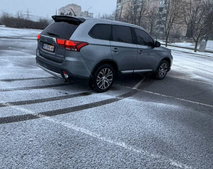 Серый Мицубиси Аутлендер, объемом двигателя 2.36 л и пробегом 205 тыс. км за 13400 $, фото 4 на Automoto.ua