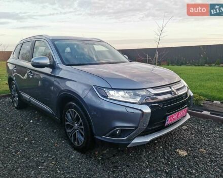 Серый Мицубиси Аутлендер, объемом двигателя 2.3 л и пробегом 130 тыс. км за 16500 $, фото 2 на Automoto.ua