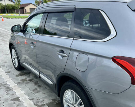 Сірий Міцубісі Аутлендер, об'ємом двигуна 2.27 л та пробігом 210 тис. км за 22000 $, фото 3 на Automoto.ua