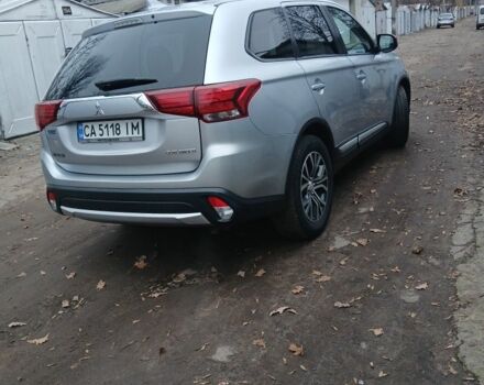 Серый Мицубиси Аутлендер, объемом двигателя 2.4 л и пробегом 250 тыс. км за 14500 $, фото 1 на Automoto.ua