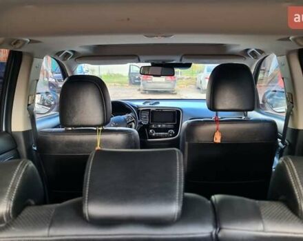 Серый Мицубиси Аутлендер, объемом двигателя 2.3 л и пробегом 253 тыс. км за 18500 $, фото 3 на Automoto.ua