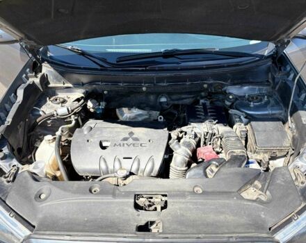 Серый Мицубиси Аутлендер, объемом двигателя 2 л и пробегом 167 тыс. км за 12900 $, фото 3 на Automoto.ua