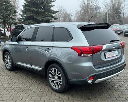 Серый Мицубиси Аутлендер, объемом двигателя 2.4 л и пробегом 205 тыс. км за 13400 $, фото 4 на Automoto.ua