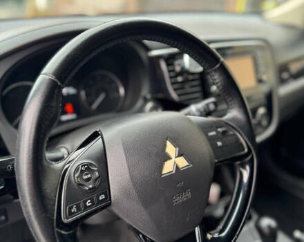 Серый Мицубиси Аутлендер, объемом двигателя 2.36 л и пробегом 182 тыс. км за 15500 $, фото 9 на Automoto.ua