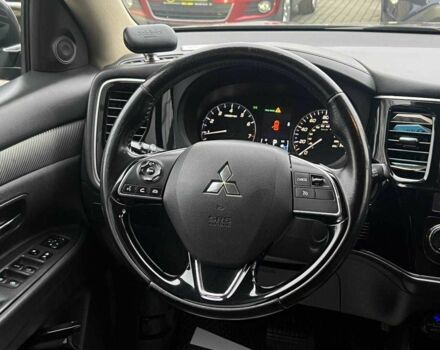 Серый Мицубиси Аутлендер, объемом двигателя 2.4 л и пробегом 160 тыс. км за 14900 $, фото 8 на Automoto.ua