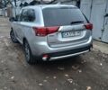 Серый Мицубиси Аутлендер, объемом двигателя 2.4 л и пробегом 250 тыс. км за 14500 $, фото 2 на Automoto.ua