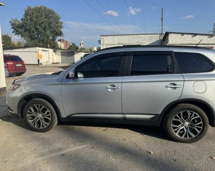 Серый Мицубиси Аутлендер, объемом двигателя 2.4 л и пробегом 125 тыс. км за 17800 $, фото 1 на Automoto.ua