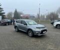 Серый Мицубиси Аутлендер, объемом двигателя 2.4 л и пробегом 205 тыс. км за 13400 $, фото 1 на Automoto.ua