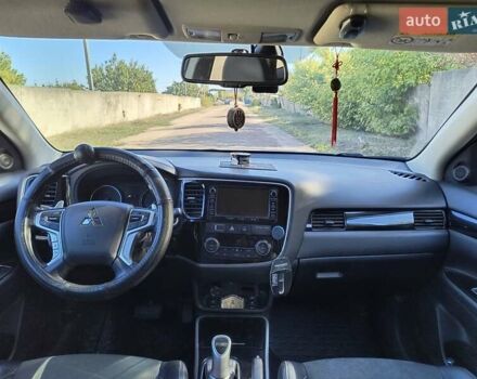 Серый Мицубиси Аутлендер, объемом двигателя 2 л и пробегом 116 тыс. км за 19000 $, фото 22 на Automoto.ua