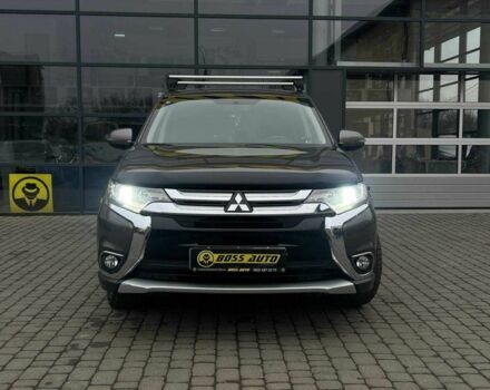 Серый Мицубиси Аутлендер, объемом двигателя 2.4 л и пробегом 160 тыс. км за 14900 $, фото 1 на Automoto.ua