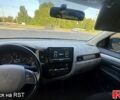 Серый Мицубиси Аутлендер, объемом двигателя 2.4 л и пробегом 187 тыс. км за 17500 $, фото 4 на Automoto.ua