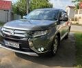 Серый Мицубиси Аутлендер, объемом двигателя 2 л и пробегом 44 тыс. км за 17900 $, фото 1 на Automoto.ua