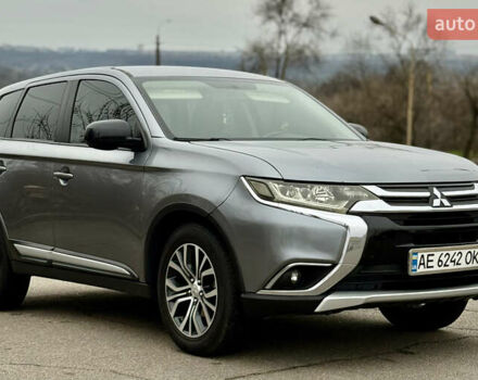 Серый Мицубиси Аутлендер, объемом двигателя 2.4 л и пробегом 148 тыс. км за 12500 $, фото 1 на Automoto.ua