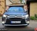 Сірий Міцубісі Аутлендер, об'ємом двигуна 2 л та пробігом 430 тис. км за 18800 $, фото 1 на Automoto.ua