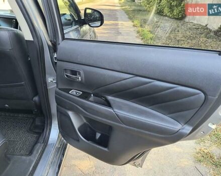 Серый Мицубиси Аутлендер, объемом двигателя 2 л и пробегом 116 тыс. км за 19000 $, фото 11 на Automoto.ua