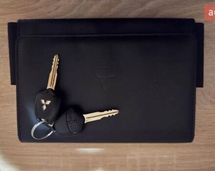 Серый Мицубиси Аутлендер, объемом двигателя 2 л и пробегом 44 тыс. км за 17900 $, фото 79 на Automoto.ua