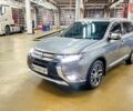 Серый Мицубиси Аутлендер, объемом двигателя 3 л и пробегом 130 тыс. км за 16750 $, фото 1 на Automoto.ua