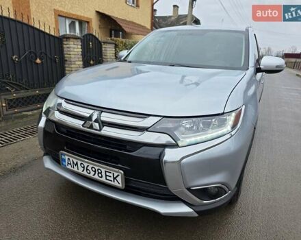 Серый Мицубиси Аутлендер, объемом двигателя 2.36 л и пробегом 170 тыс. км за 13800 $, фото 1 на Automoto.ua