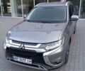 Серый Мицубиси Аутлендер, объемом двигателя 2.4 л и пробегом 87 тыс. км за 16500 $, фото 1 на Automoto.ua