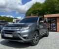 Серый Мицубиси Аутлендер, объемом двигателя 2.4 л и пробегом 155 тыс. км за 15500 $, фото 1 на Automoto.ua