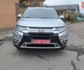 Серый Мицубиси Аутлендер, объемом двигателя 2.36 л и пробегом 120 тыс. км за 16100 $, фото 1 на Automoto.ua