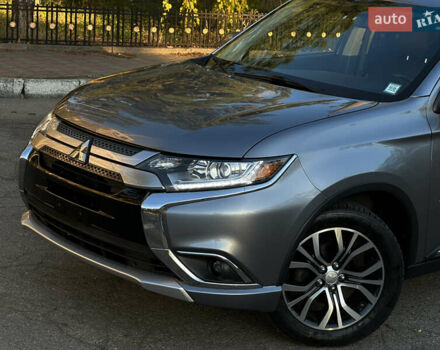 Серый Мицубиси Аутлендер, объемом двигателя 2.4 л и пробегом 167 тыс. км за 15999 $, фото 2 на Automoto.ua