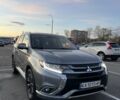 Серый Мицубиси Аутлендер, объемом двигателя 2 л и пробегом 210 тыс. км за 21000 $, фото 1 на Automoto.ua