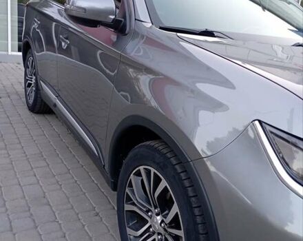 Серый Мицубиси Аутлендер, объемом двигателя 2.4 л и пробегом 87 тыс. км за 16500 $, фото 1 на Automoto.ua