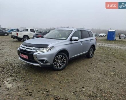 Серый Мицубиси Аутлендер, объемом двигателя 2.3 л и пробегом 205 тыс. км за 15999 $, фото 2 на Automoto.ua
