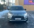Сірий Міцубісі Аутлендер, об'ємом двигуна 2.36 л та пробігом 241 тис. км за 13700 $, фото 1 на Automoto.ua