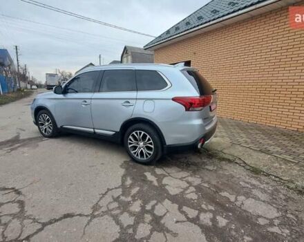 Серый Мицубиси Аутлендер, объемом двигателя 2.36 л и пробегом 120 тыс. км за 16100 $, фото 3 на Automoto.ua