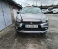 Сірий Міцубісі Аутлендер, об'ємом двигуна 2.4 л та пробігом 186 тис. км за 8800 $, фото 1 на Automoto.ua