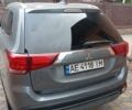 Серый Мицубиси Аутлендер, объемом двигателя 2.36 л и пробегом 65 тыс. км за 14850 $, фото 1 на Automoto.ua