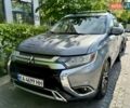 Серый Мицубиси Аутлендер, объемом двигателя 3 л и пробегом 223 тыс. км за 13400 $, фото 1 на Automoto.ua
