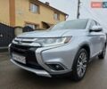 Серый Мицубиси Аутлендер, объемом двигателя 2.36 л и пробегом 170 тыс. км за 13800 $, фото 1 на Automoto.ua