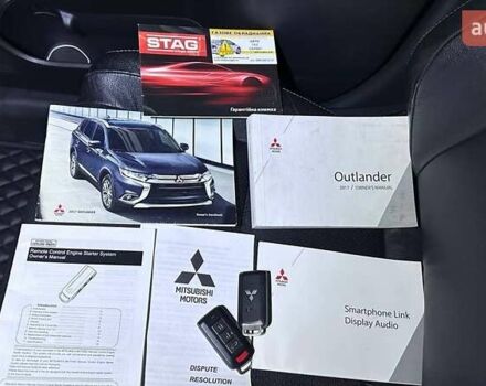 Серый Мицубиси Аутлендер, объемом двигателя 3 л и пробегом 130 тыс. км за 16750 $, фото 35 на Automoto.ua