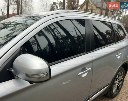 Серый Мицубиси Аутлендер, объемом двигателя 2.4 л и пробегом 189 тыс. км за 16950 $, фото 130 на Automoto.ua