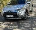 Серый Мицубиси Аутлендер, объемом двигателя 2.36 л и пробегом 118 тыс. км за 18500 $, фото 1 на Automoto.ua